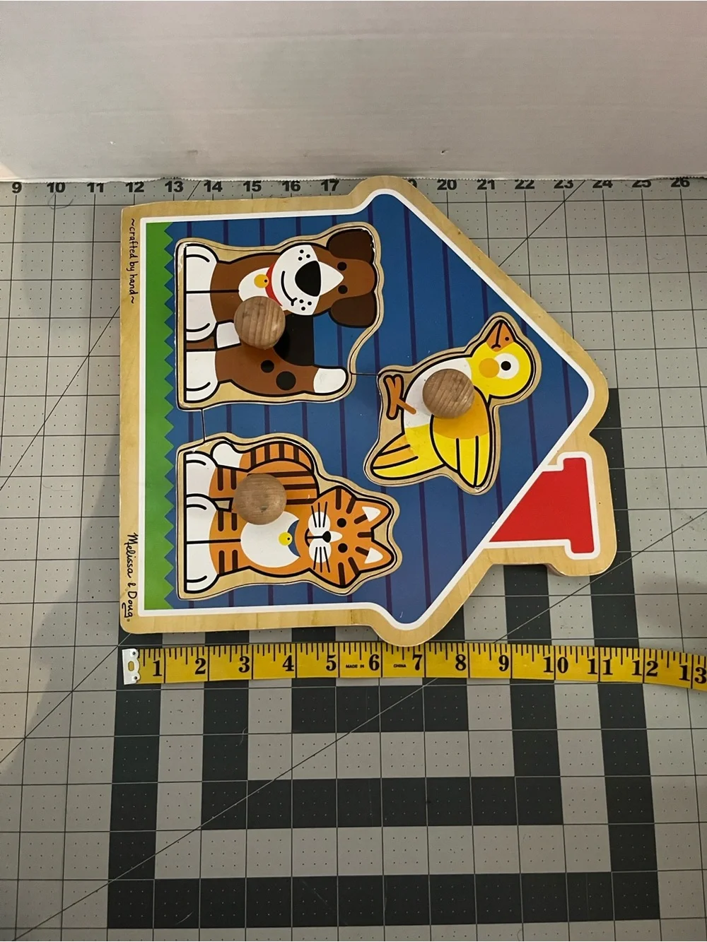 Melissa & Doug Wooden House Peg Puzzle with Blue, Yellow, Brown, Orange